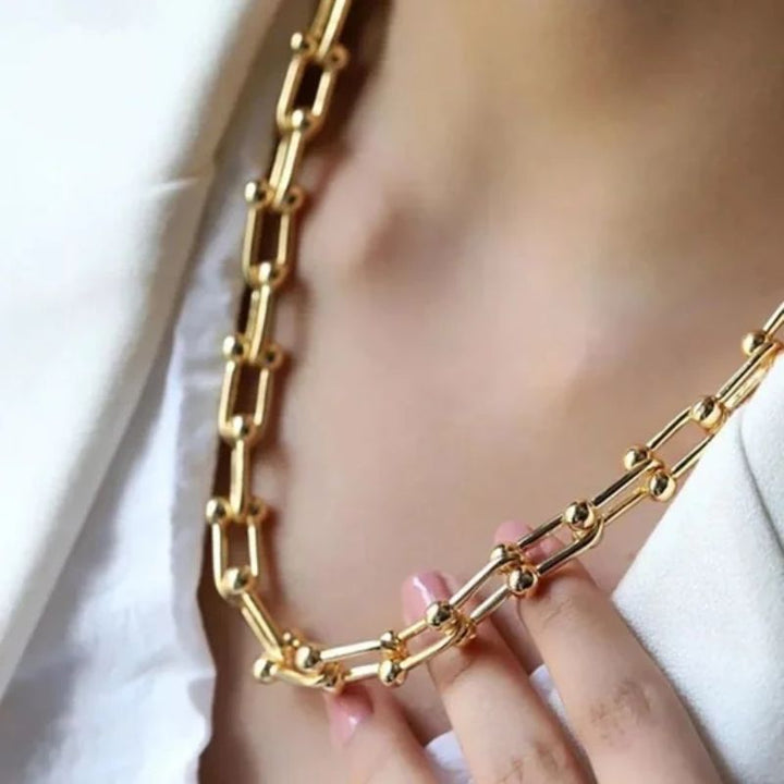 A Golden Statement of Strength, Style, and Self-Belief for Every Day