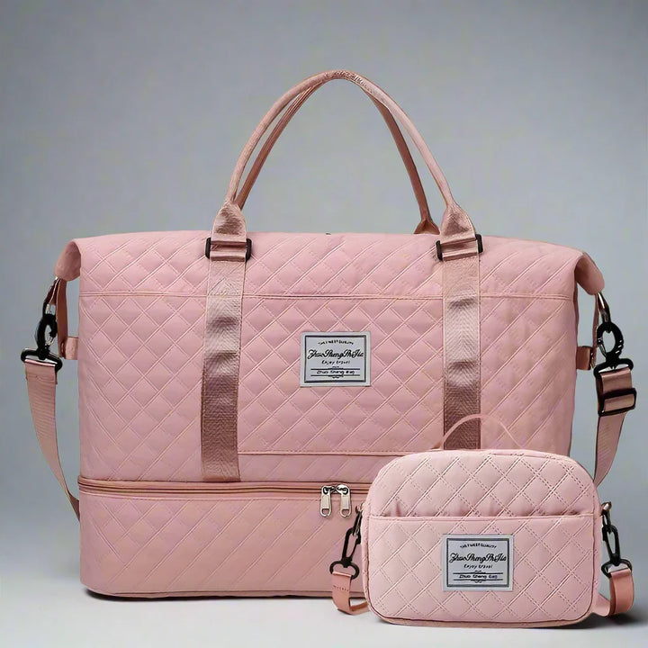 Duffle bag with trolley sleeve placed on rolling suitcase
