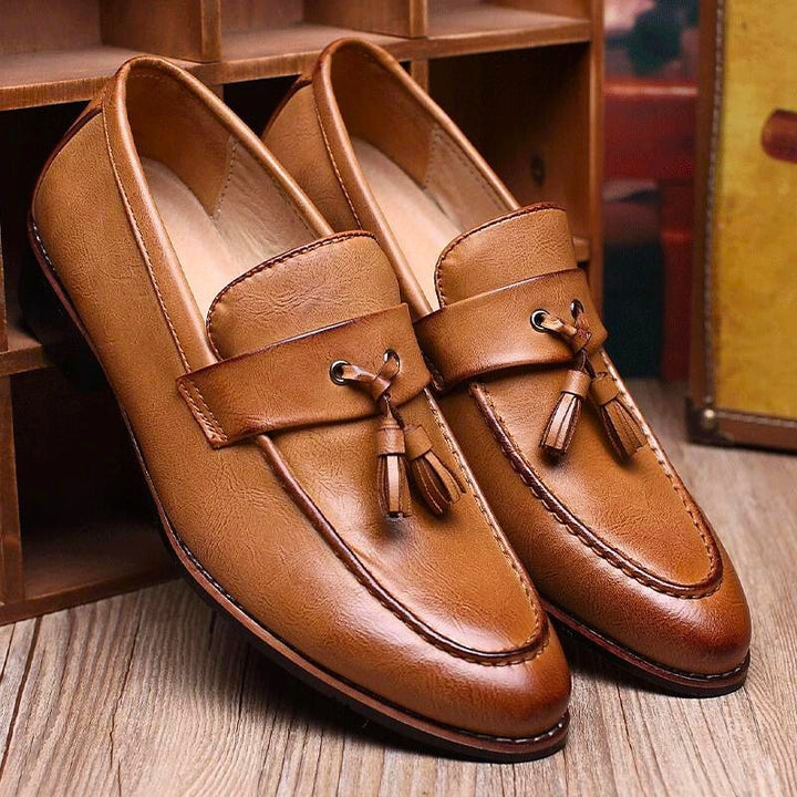 Side profile of classic men’s loafers in premium leather
