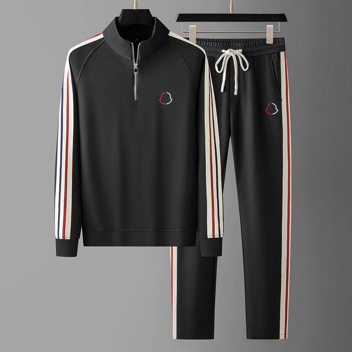 Side angle of men's athletic matching set with joggers

