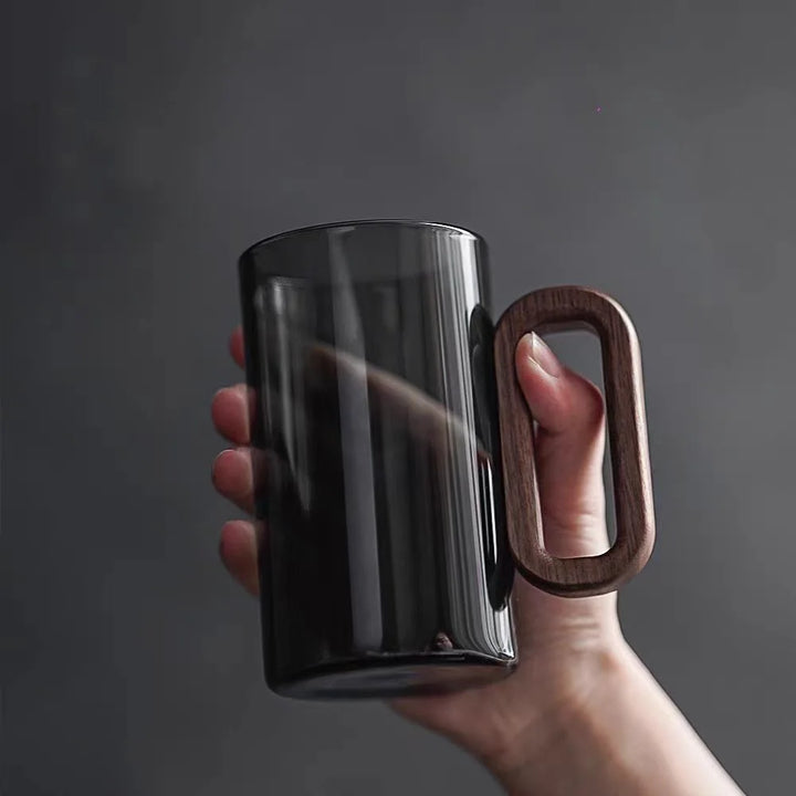 Hand holding ceramic Nordwave Mug with matte finish
