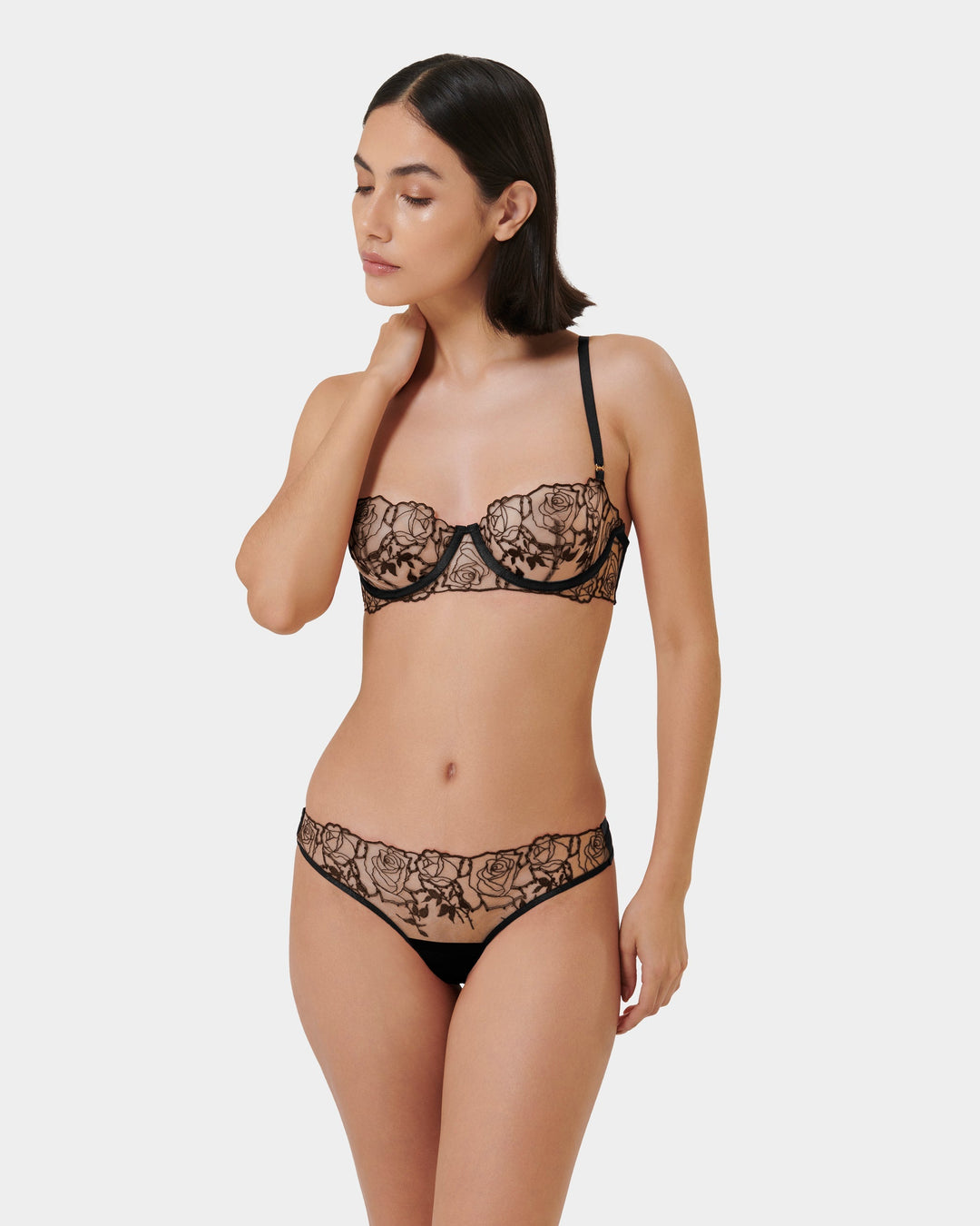 Model wearing Rosalie Midnight Bloom Bra with sheer panels
