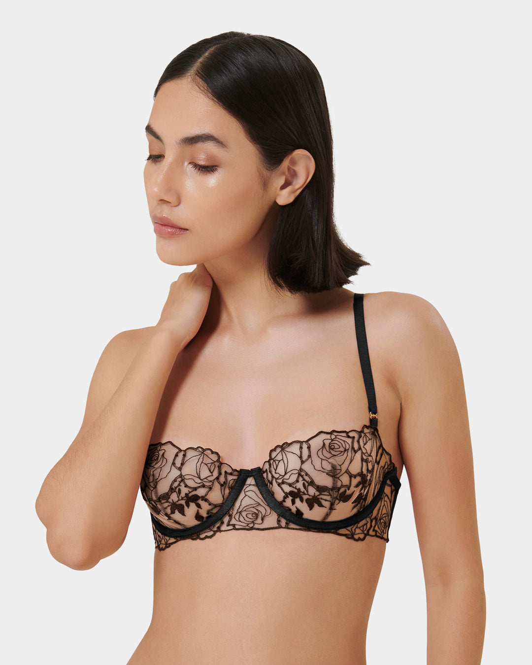 Side view showing underwire structure and floral lace design
