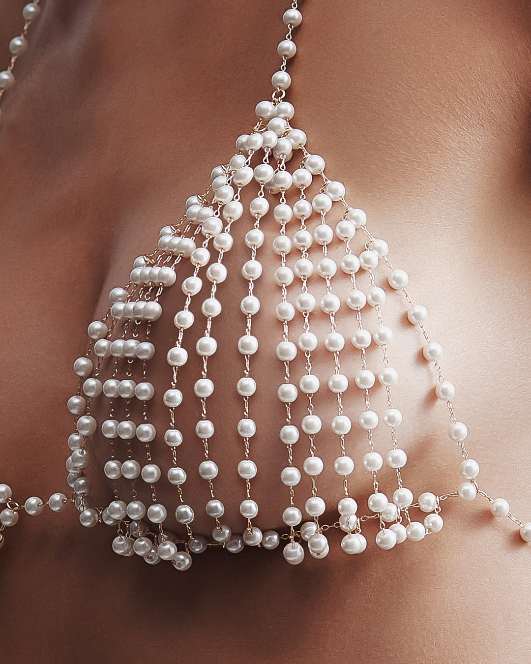 Rose Pearl bra laid flat showing lace details and straps

