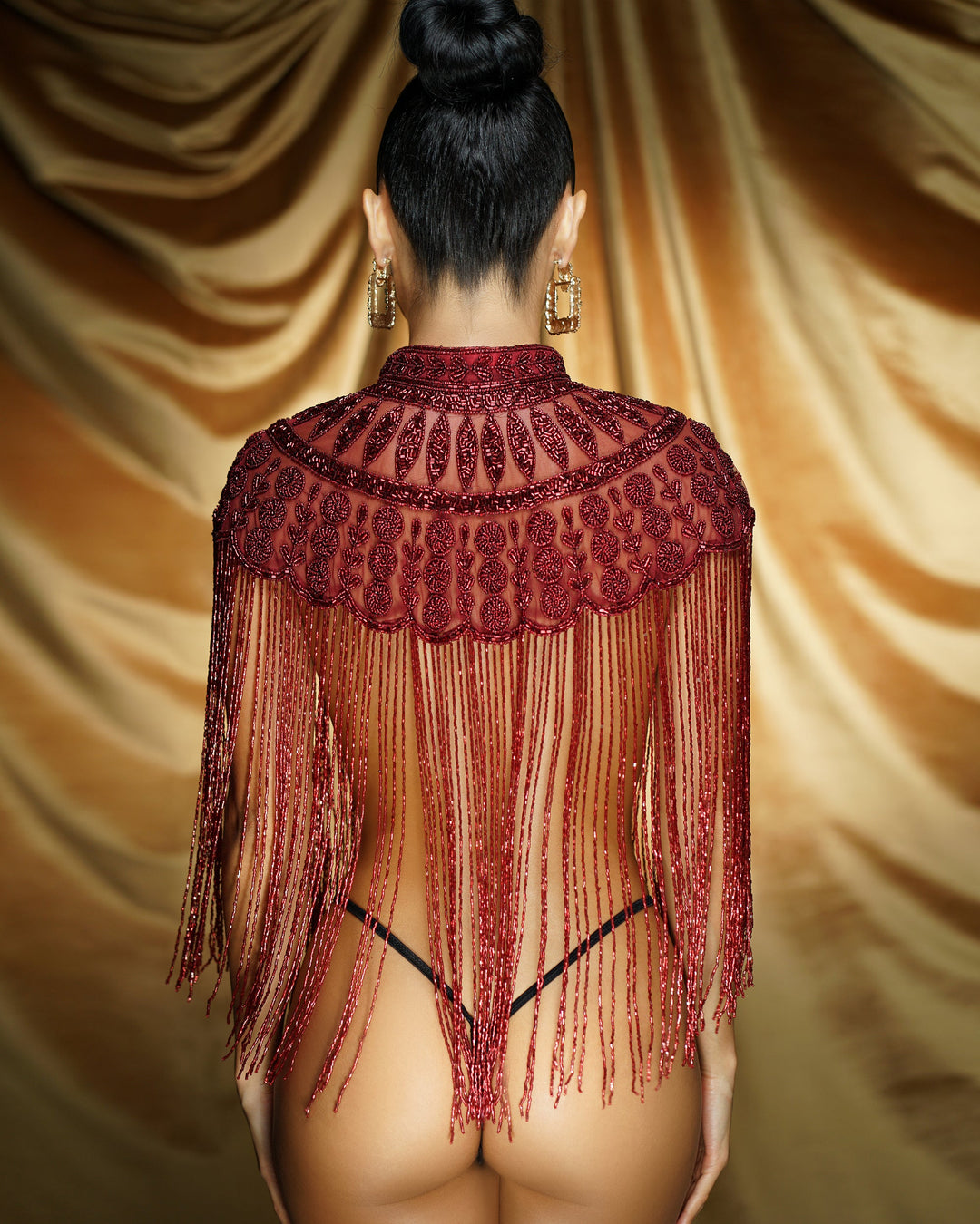 Elegant evening shawl draped on woman’s shoulders
