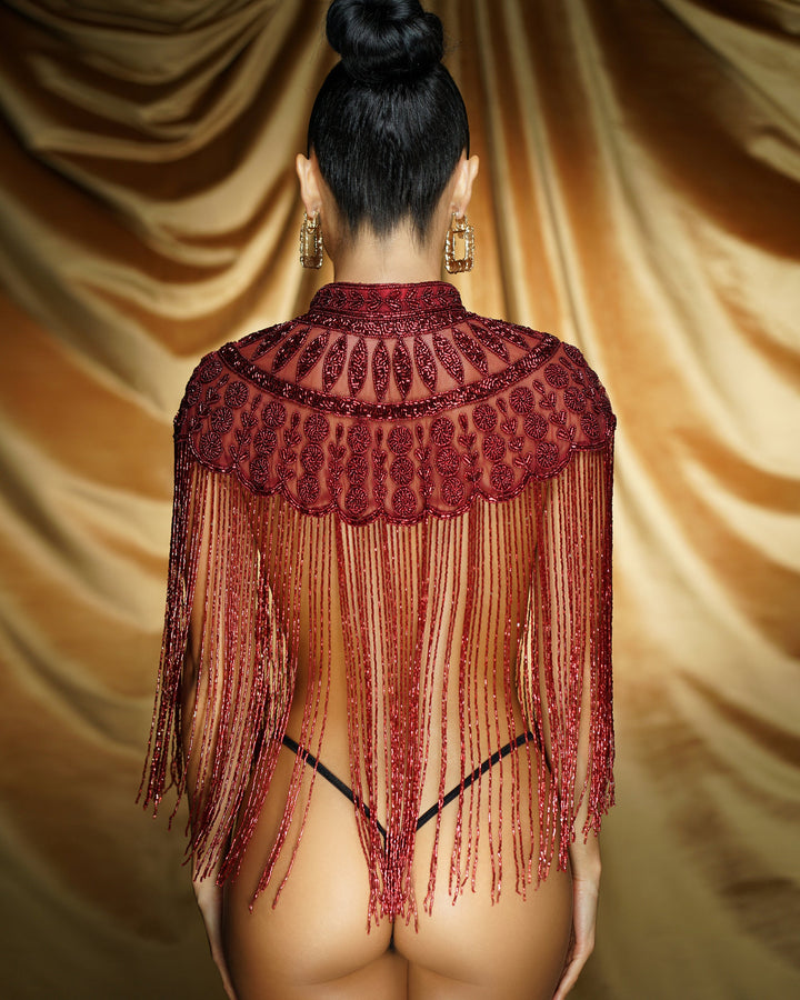 Elegant evening shawl draped on woman’s shoulders
