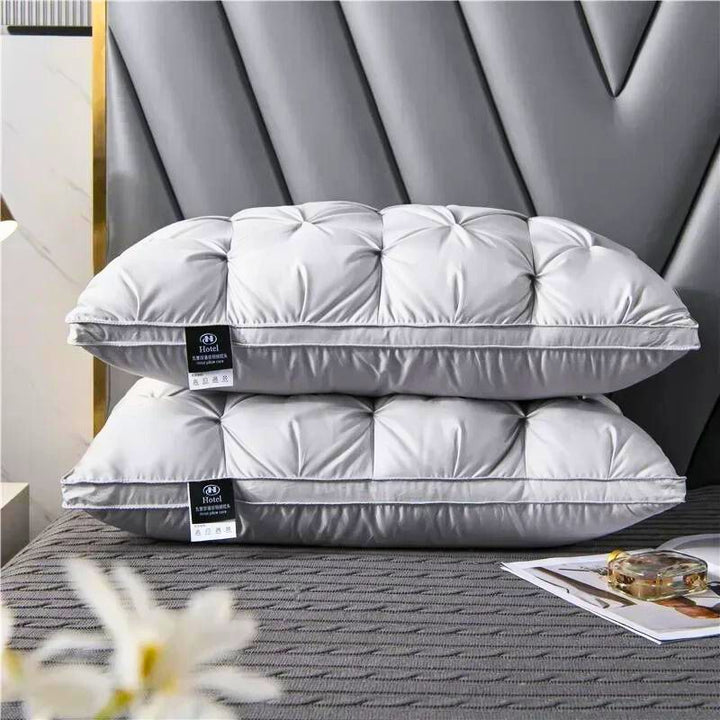 SleepWell Goose Down Pillow on white bedding – luxury hotel look
